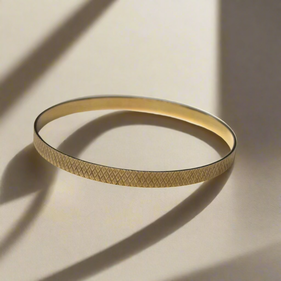 Previously Owned 9ct Yellow Gold 5mm Diamond Cut Bangle